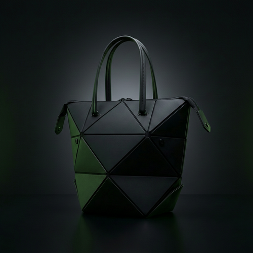 Geometric handbag with green and black color scheme on a dark background