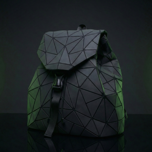 Geometric backpack with a green and black color scheme on a dark background